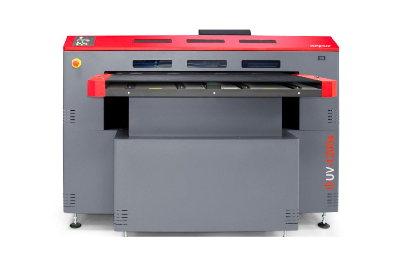 <p>The new Compress UV-1200 offered by Offitek features a large printing area (1137 x 750 mm) and twin UV led lamps</p>
